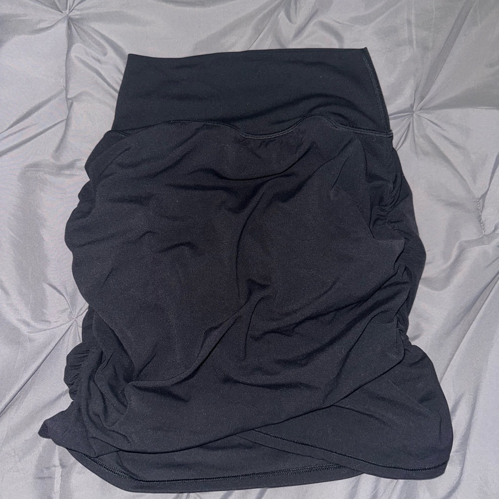 Athleta skirt ;  waist to hem about 19 in., material is 75% nylon and 25% Lycra
